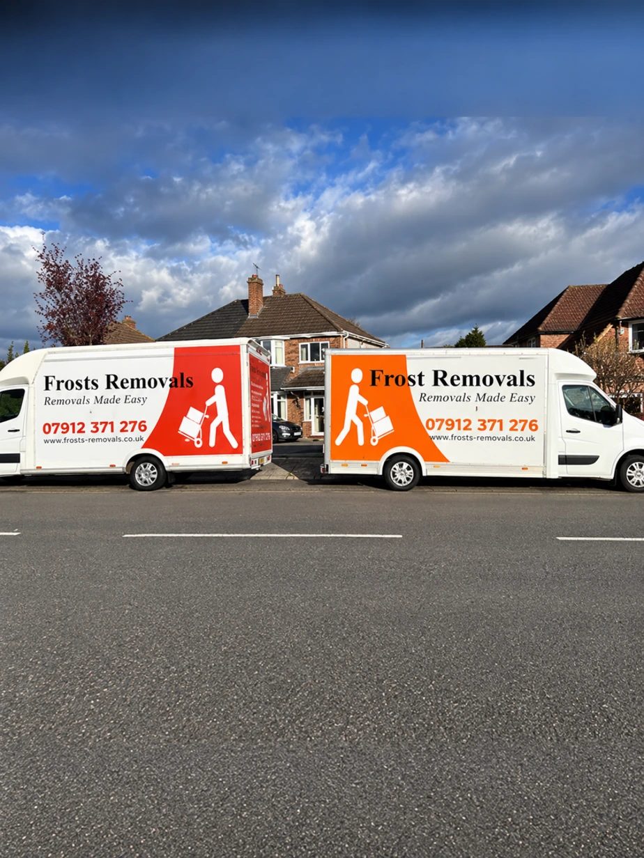 The Frosts Removals team loading a van using a ramp